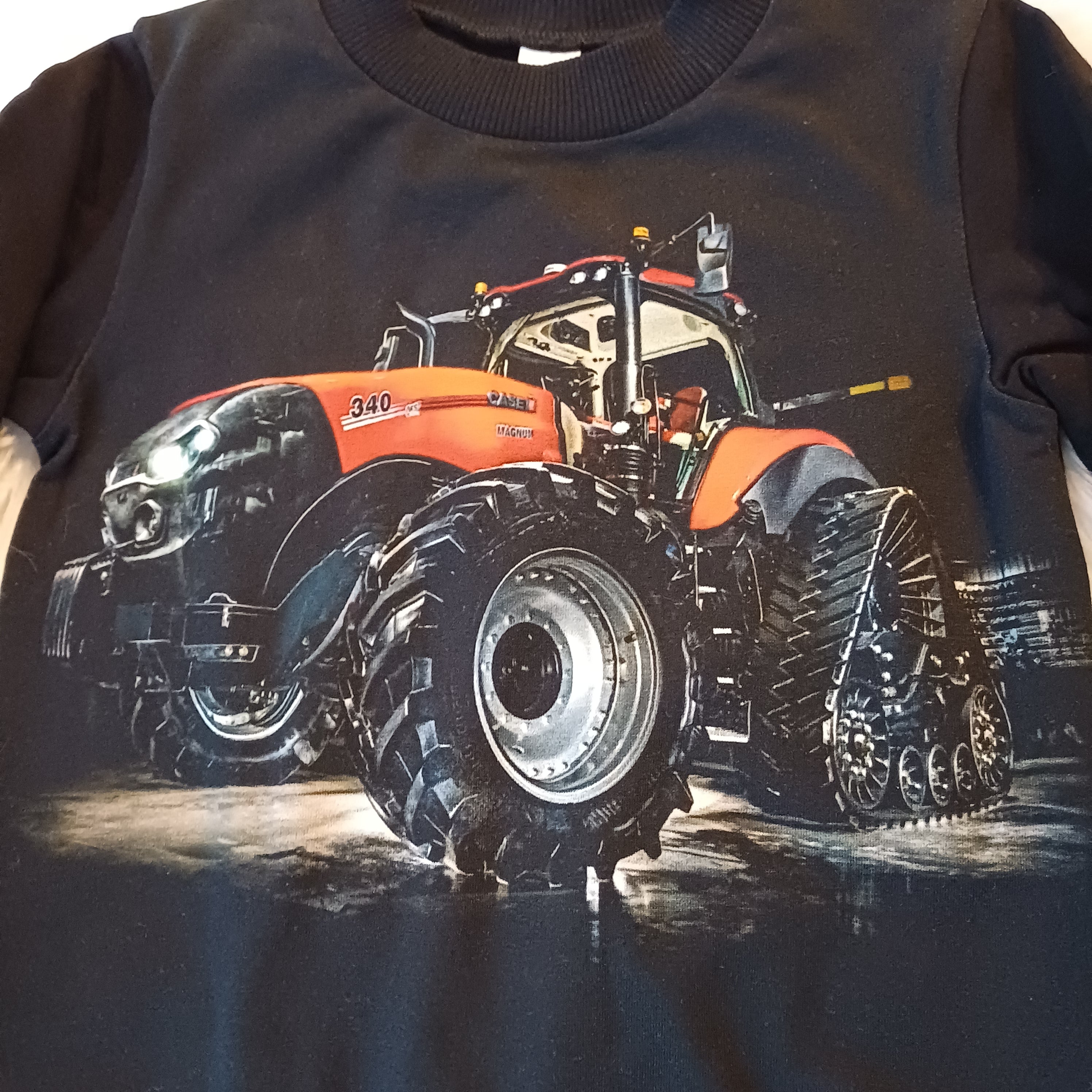 Vaikiškas džemperis su traktoriumi 110d